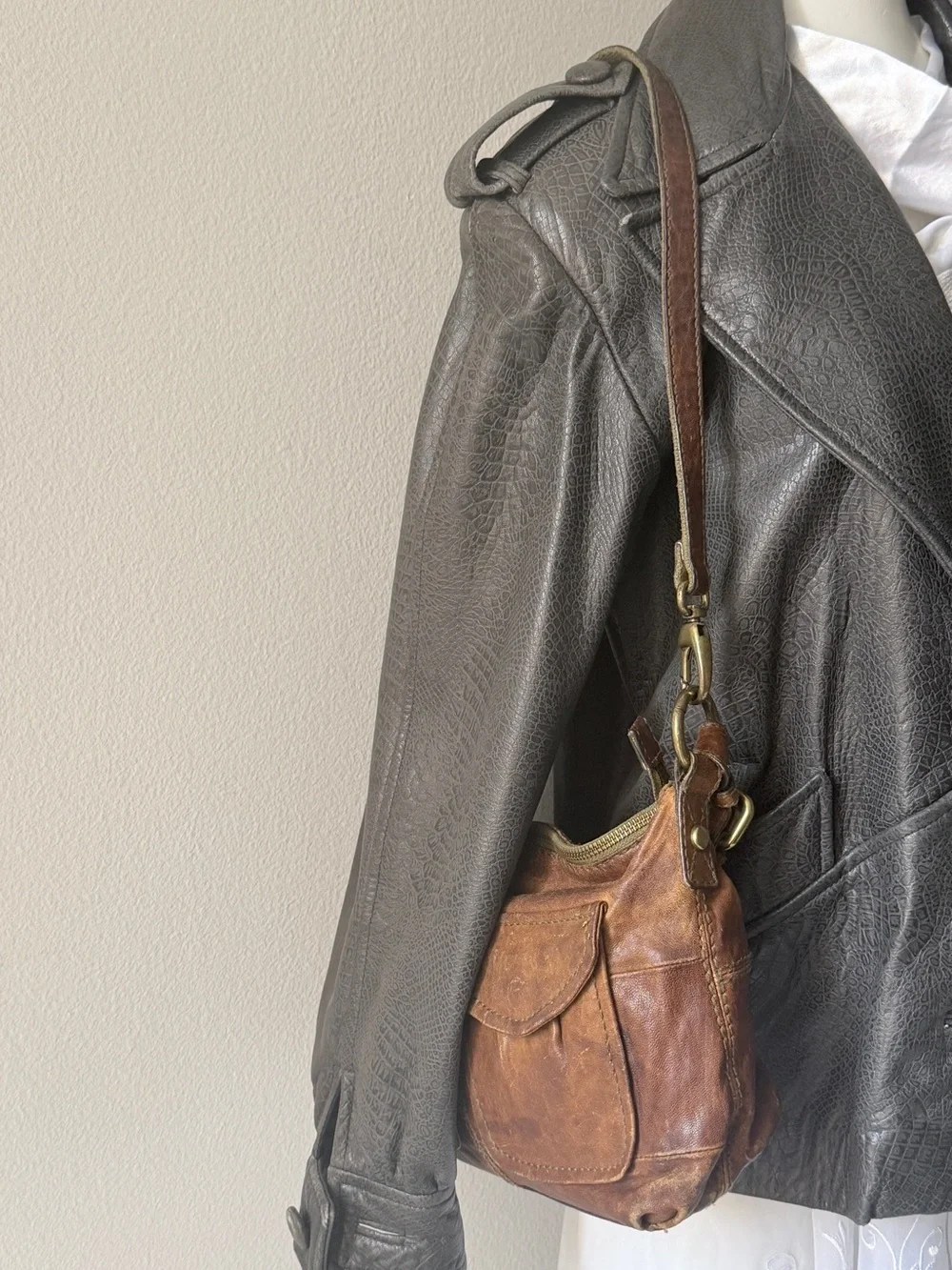Hyper Distressed Fossil Vintage Bag.